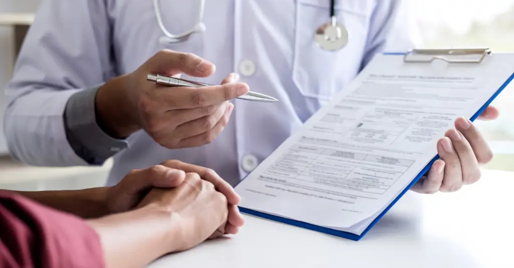 Physician explaining POS 11 office visit details to a patient during a medical billing consultation.